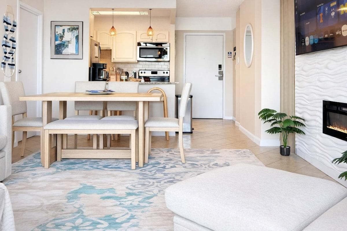 Gather around the dining table, seats six, perfect for family meals, game nights, or a relaxed breakfast with stunning views.